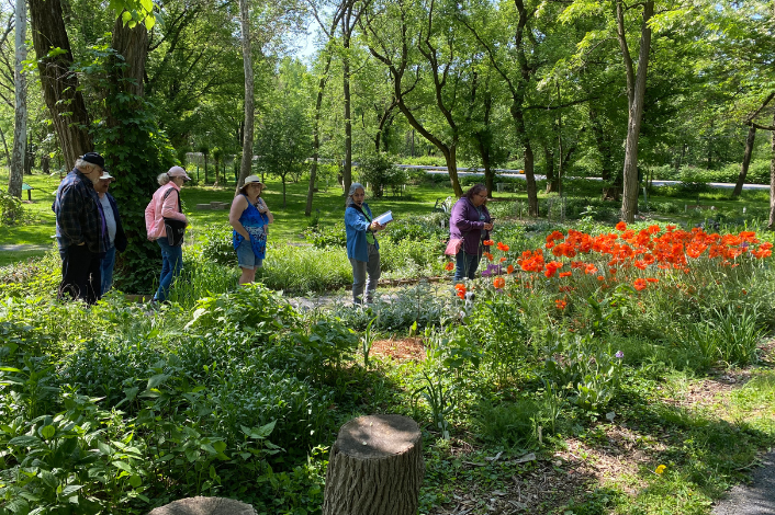 A group of people exploring the 5 Senses Garden in Harrisburg PA