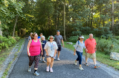 A group of people walking at Wildwood Park