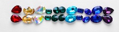 pairs of similar stones in colors red, yellow, clear, green, blue, and purple